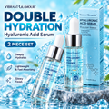Vibrant Glamour Double Hydration Hyaluronic Acid Serum 2-piece set, featuring a clear glass dropper bottle and its matching blue box, styled with water droplets and ice on a marble slab.