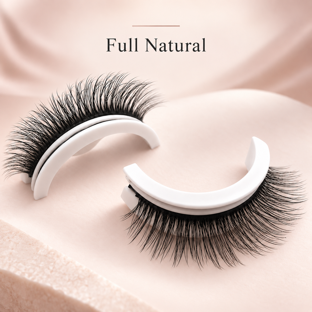 A pair of false eyelashes displayed on white curved holders against a soft blush pink background, with the text 'Full Natural' above.